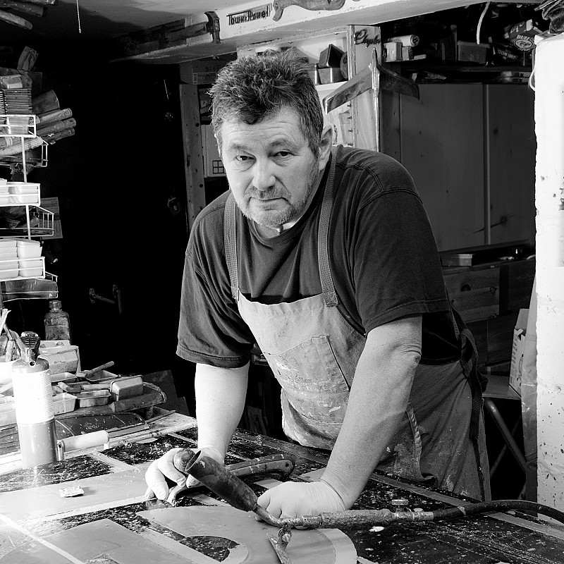 Kevin Ghiglione working on an encaustic artwork